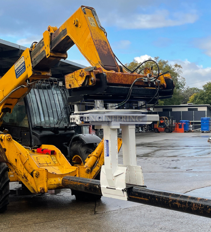 FRPS140 Rotating Pole Setter attachment on telehandler