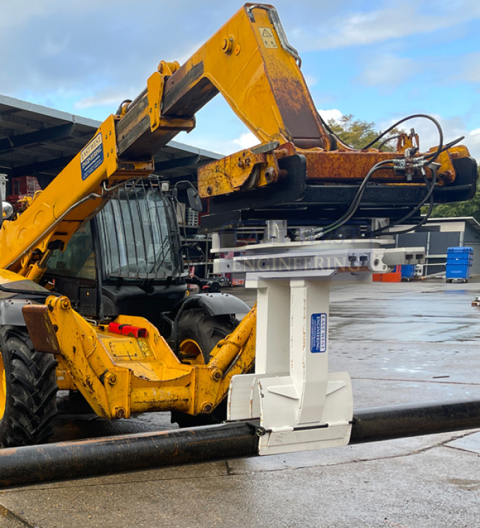 FRPS140 Rotating Pole Setter attachment on telehandler